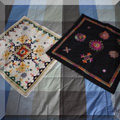 N12. Embroidered cream and black pillow covers. - $16